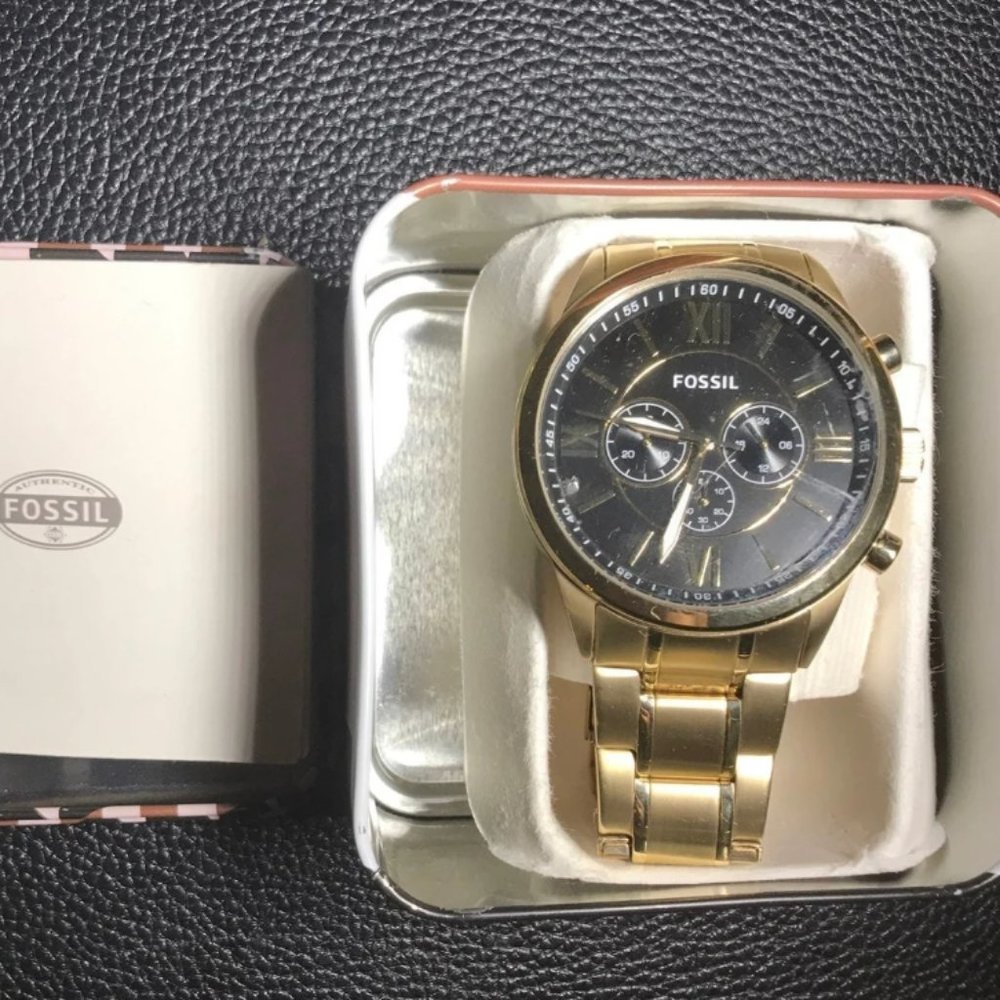 Gold fossil watch